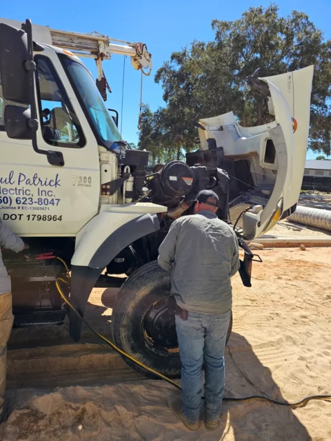 Paul Patrick Electric service truck on a job site